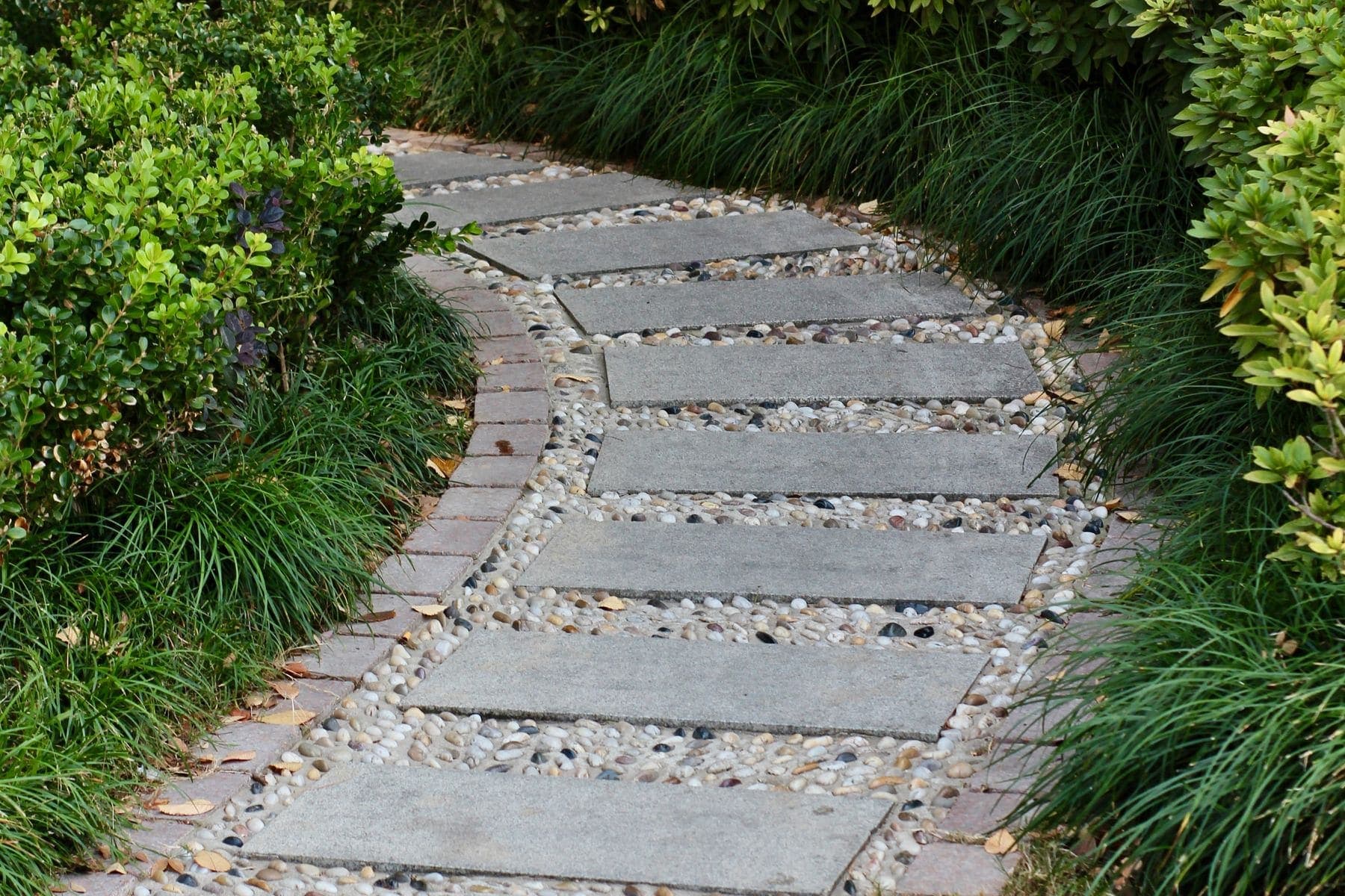 A paver walkway with crisp edges and consistent joint lines