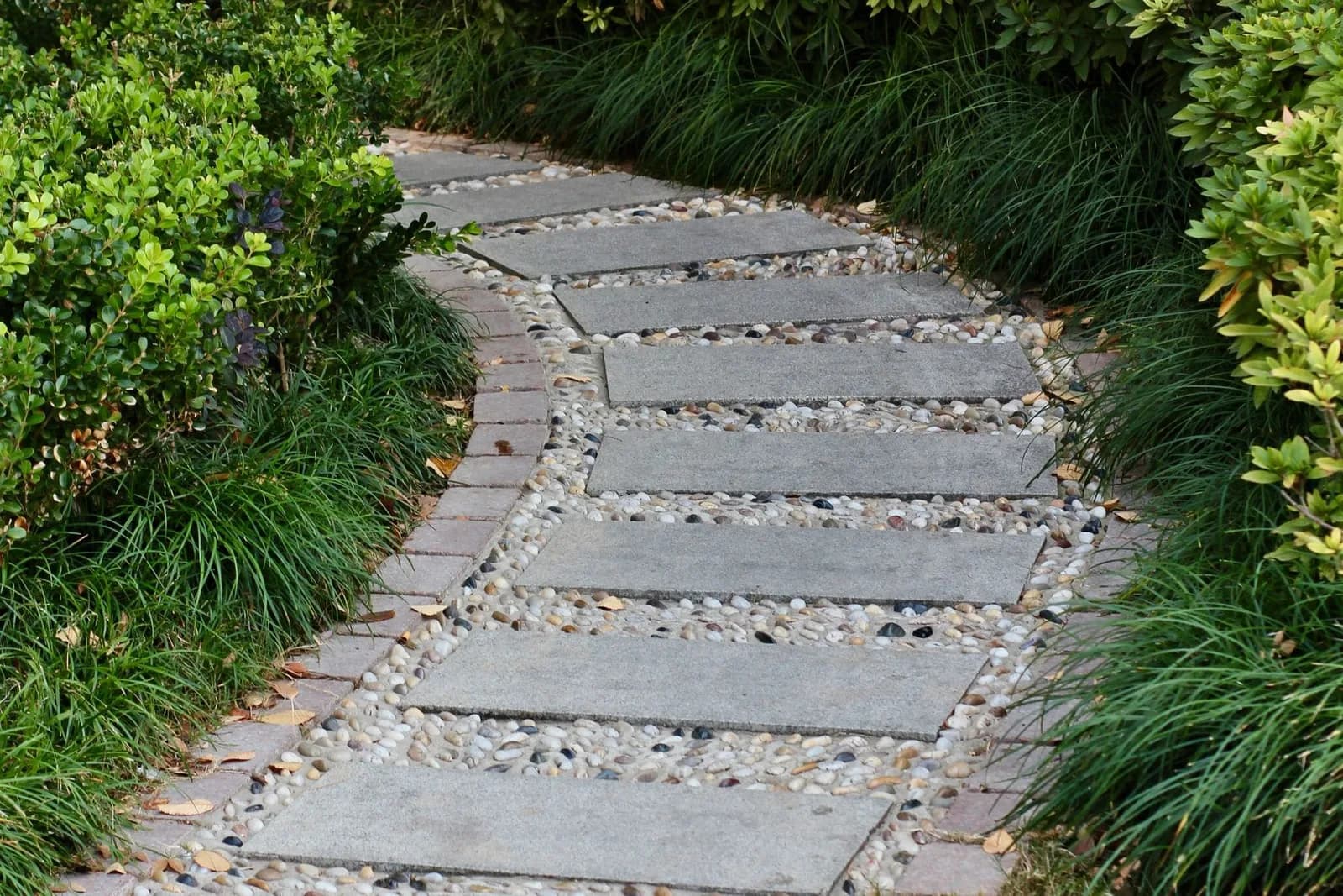 Curved Paver Walkway — completed patios & walkways project by VP Landscaping