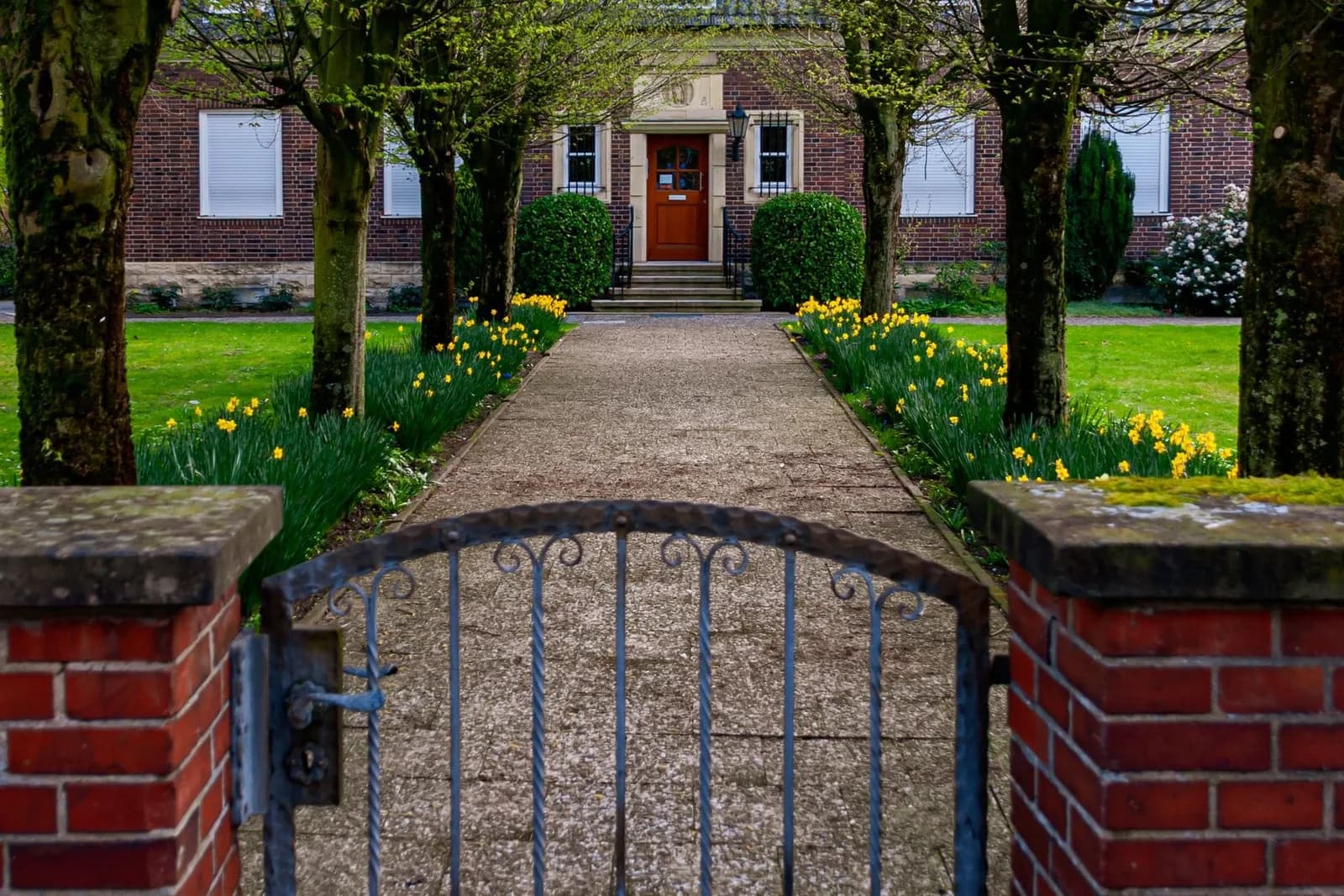 Tired HOA Entrance Rebuilt — after the work, commercial grounds